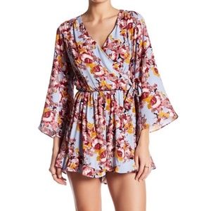 ASTR Purple Floral 3/4 Sleeve Faux Wrap Romper